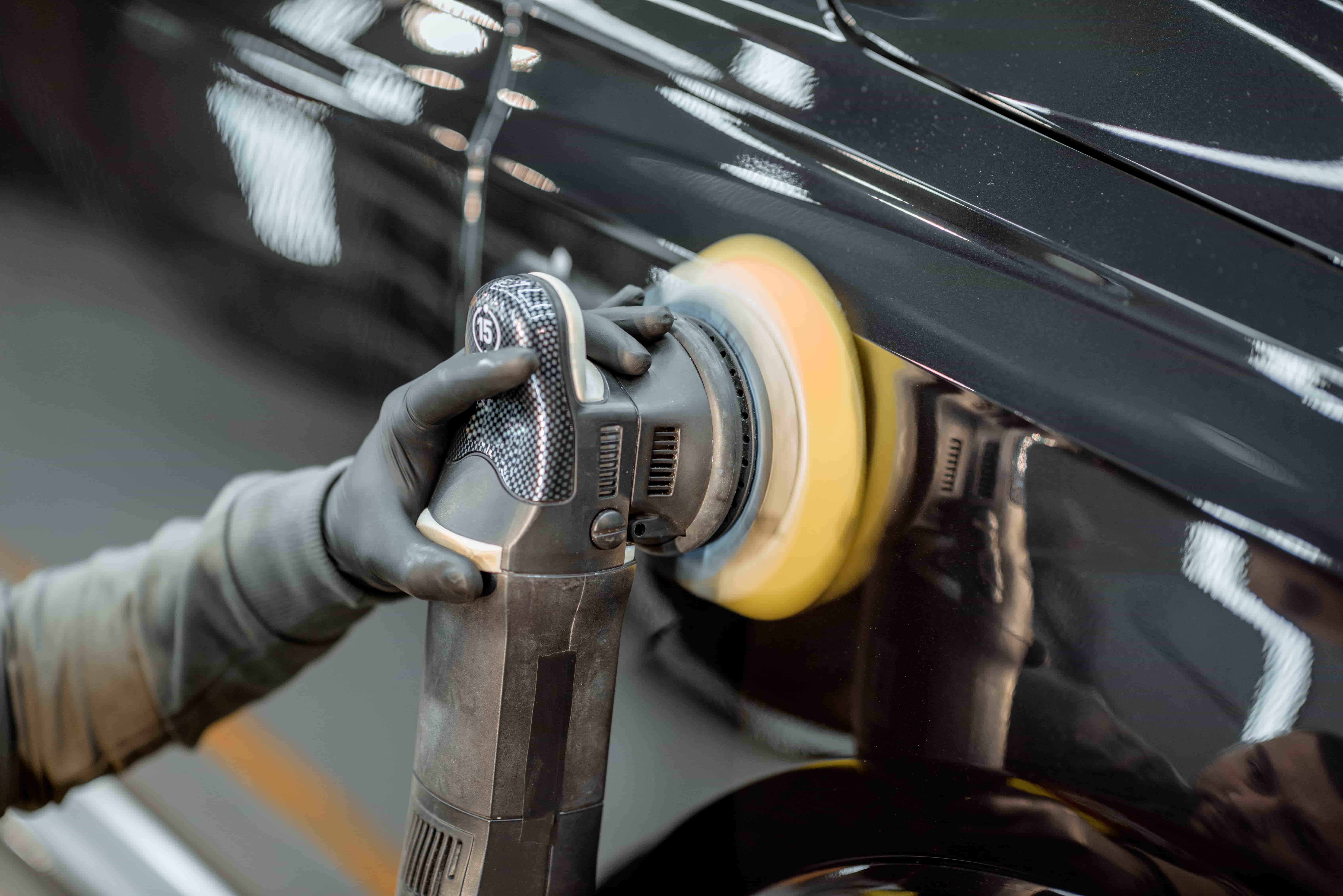 Car Servicing & Repairs in South Morang Professional car detailing and polishing service in South Morang - Expert technician buffing vehicle exterior